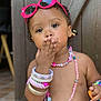 accessories, beads, bracelets, child, cute, expression, face, fashion, hand, necklaces, outdoor, person, pink, portrait, skin, smile, sunglasses, toddler, wooden_background, young