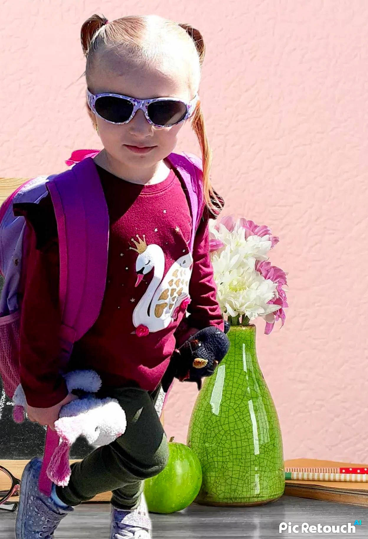 Luna is registered to the contest to win money with this photo: eyewear, fashion, flower, glasses, goggles, grass, happy, magenta, person, personal_protective_equipment, pink, plant, purple, shoe, sleeve, sneakers, sunglasses, textile, toddler, vase