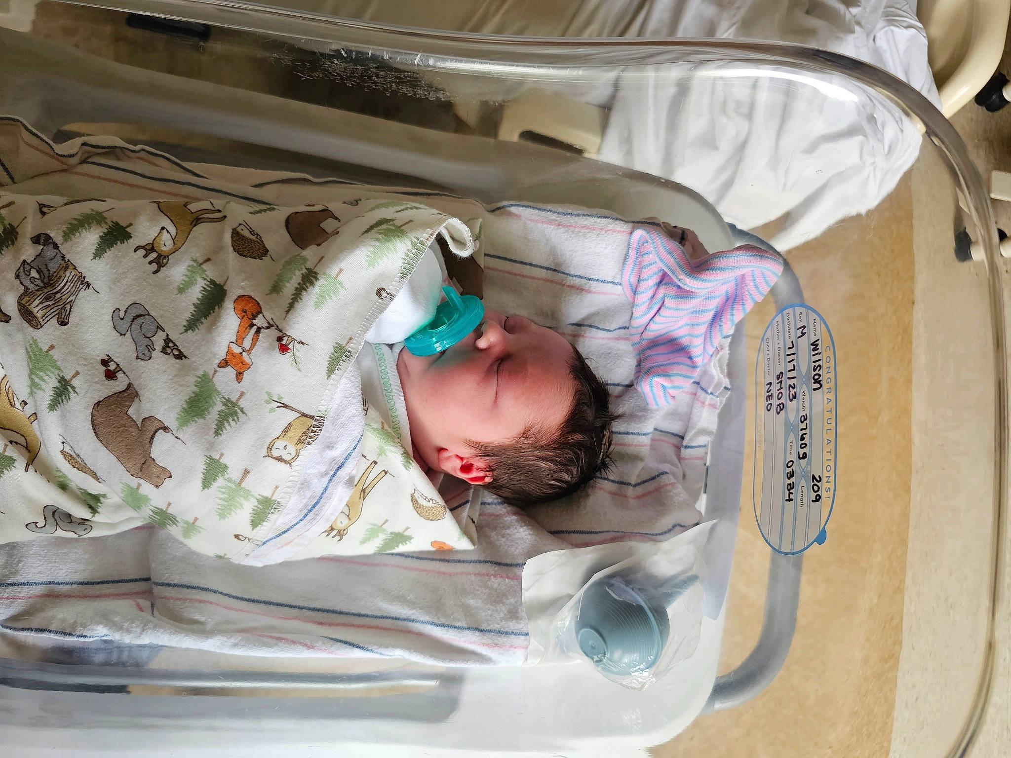 Colt is registered to the contest to win money with this photo: baby, baby_products, baby_safety, baby_toddler_clothing, child, comfort, event, hospital, infant_bed, linens, person, product, room, toddler