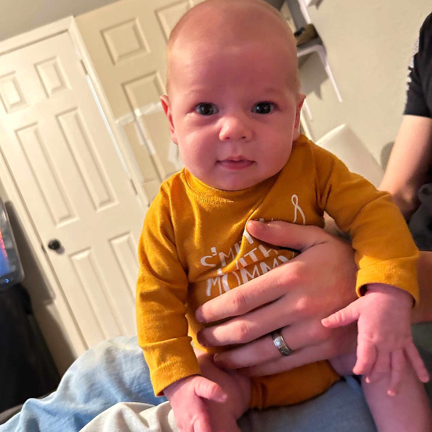 Xandri joined the competition — help win amazing prizes! accessories, baby, babylaughing, bodypart, bracelet, clothing, face, finger, furniture, hand, happy, head, indoors, pants, person, photography, portrait, sitting, smile, t_shirt