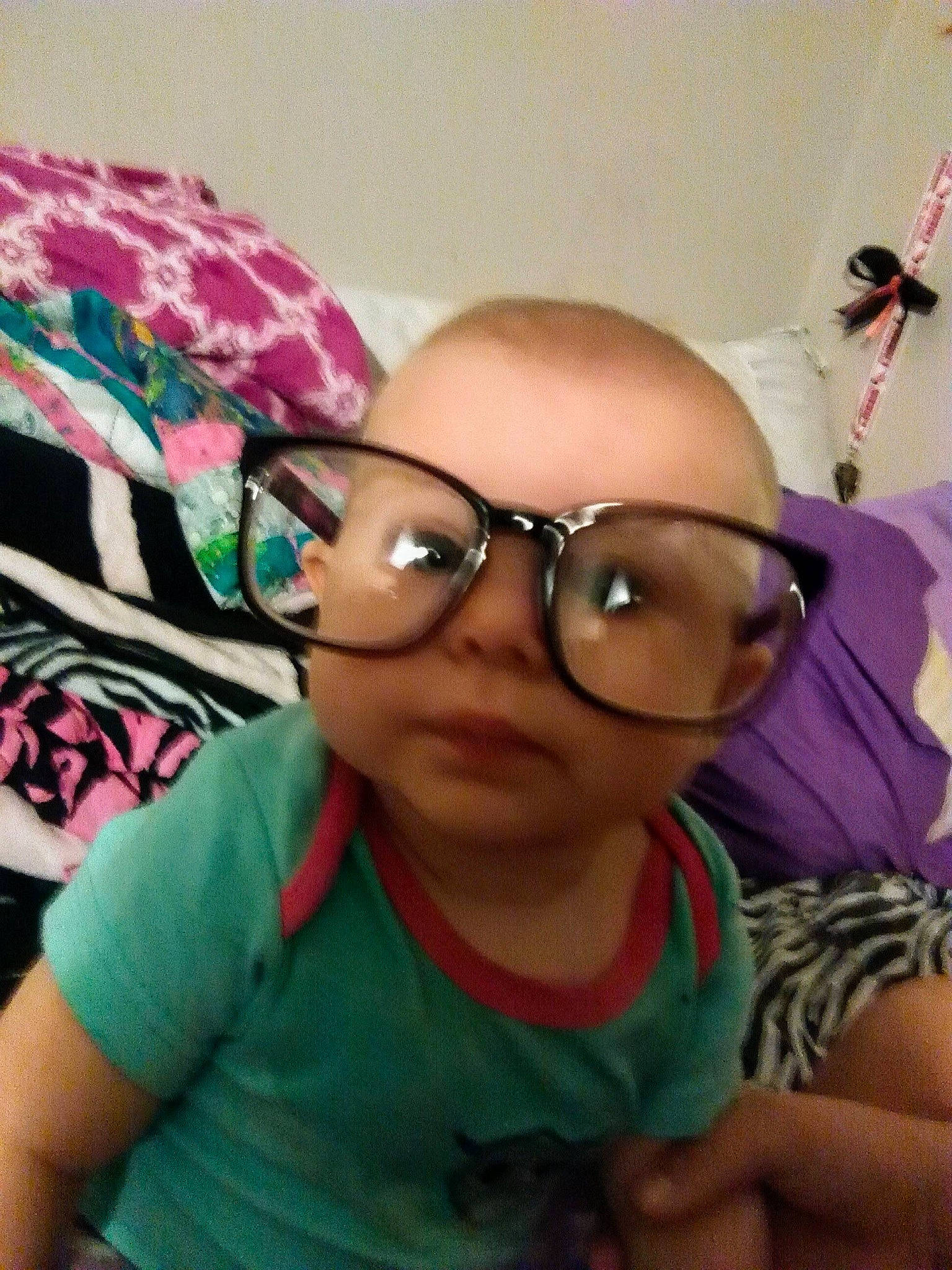 Brooklynn is registered to the contest to win money with this photo: arm, baby_toddler_clothing, cap, cheek, cool, eyebrow, eyelash, eyewear, fun, glasses, happy, lip, nose, person, pink, purple, skin, sleeve, t_shirt, toddler