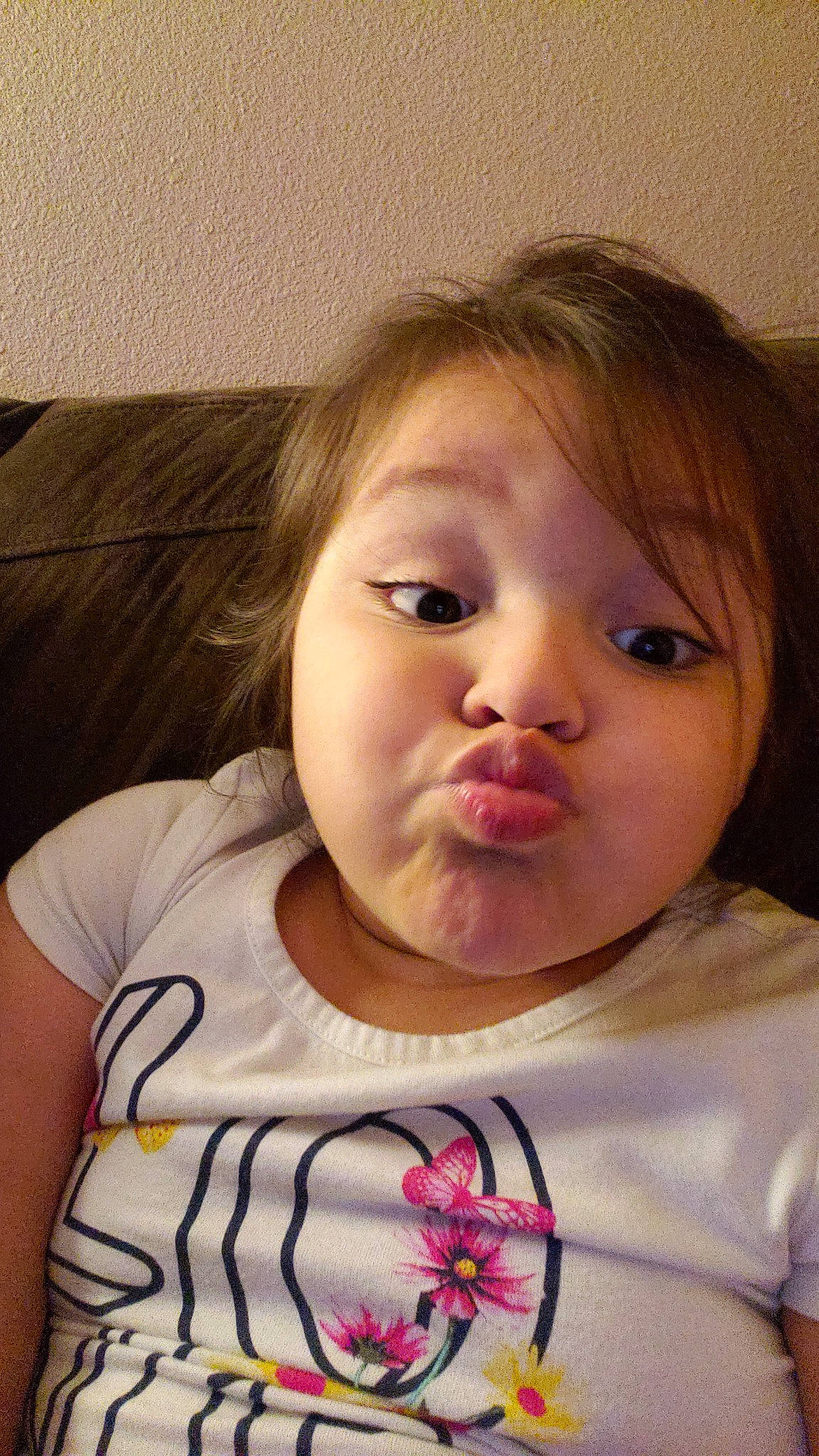 Emma Jean is registered to the contest to win money with this photo: baby, brown_hair, cheek, child, chin, ear, eye, face, forehead, fun, hair, head, iris, lip, mouth, neck, nose, person, pink, skin