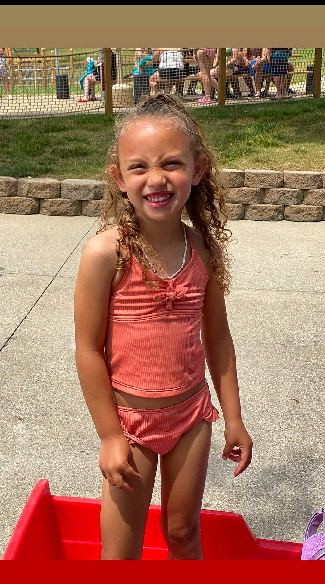 Brookelynn is registered to the contest to win money with this photo: brown_hair, chest, event, face, fun, grass, hairstyle, happy, human_leg, jewellery, joy, leisure, necklace, person, pink, recreation, smile, summer, thigh, toddler