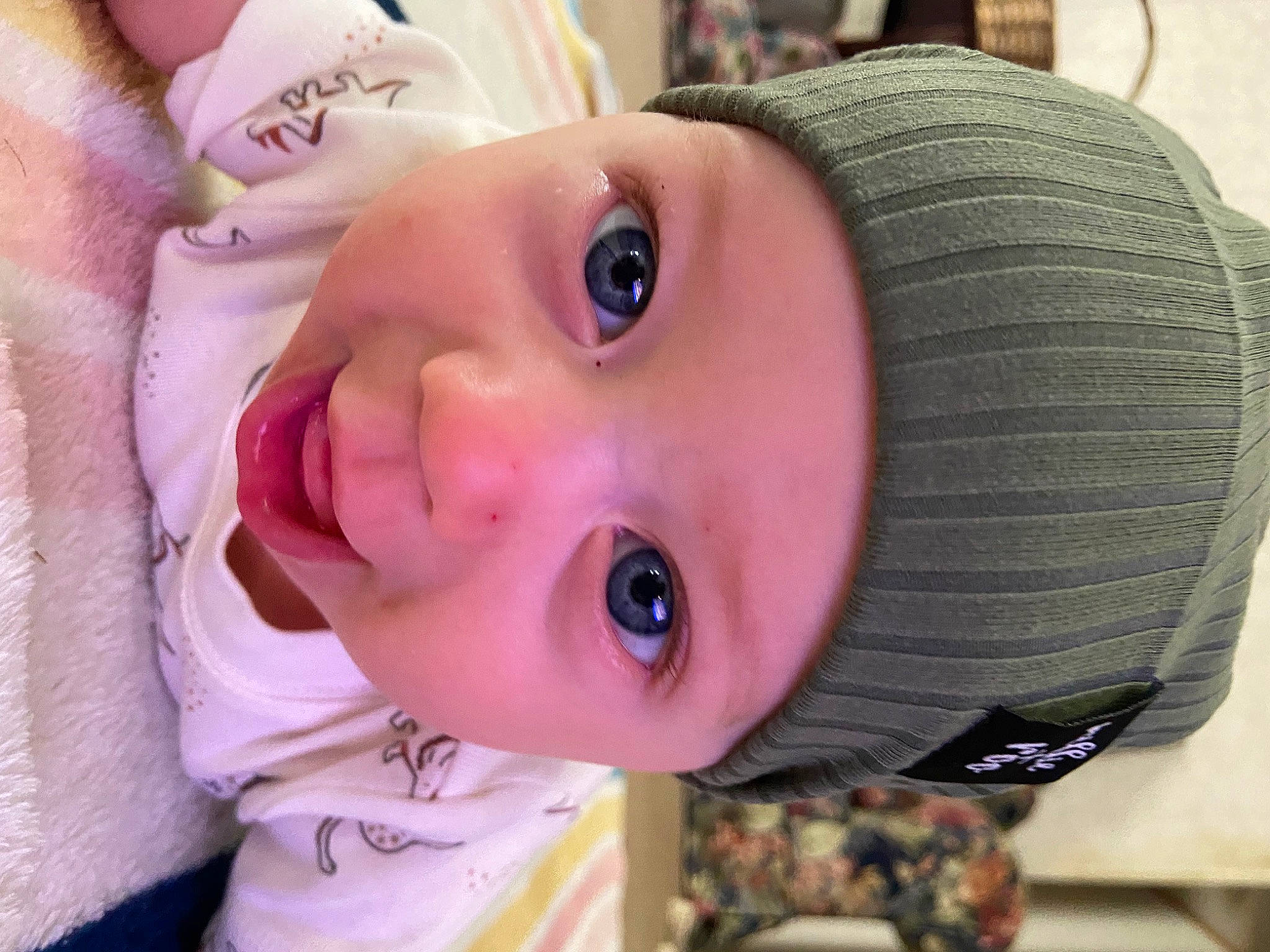 Kace is registered to the contest to win money with this photo: baby, cap, cheek, cool, ear, eye, eyebrow, eyelash, forehead, headgear, headwear, iris, lip, mouth, neck, nose, person, pink, skin, smile