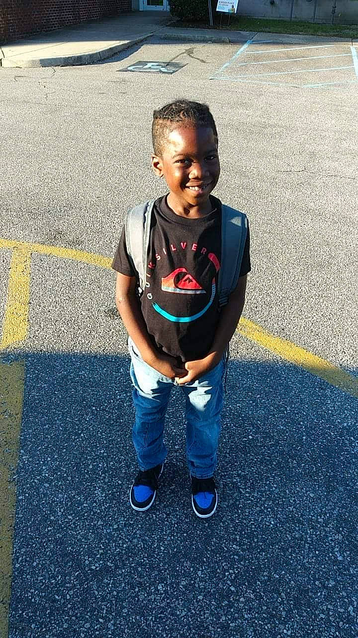 Montreal joined the competition — help win amazing prizes! asphalt, blue, child, cool, denim, face, footwear, fun, head, jeans, joy, male, people, person, shoe, sky, smile, standing, t_shirt, toddler