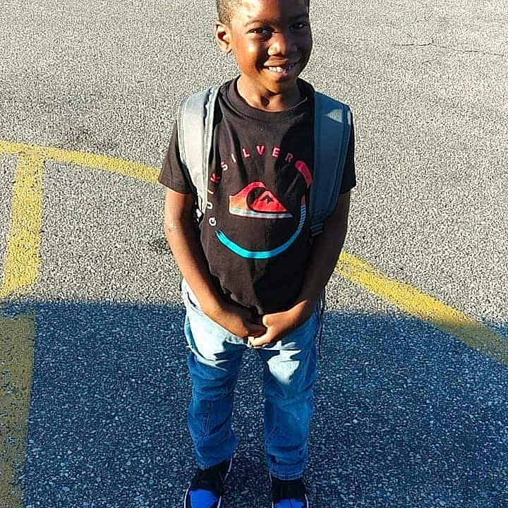 Montreal joined the competition — help win amazing prizes! asphalt, blue, child, cool, denim, face, footwear, fun, head, jeans, joy, male, people, person, shoe, sky, smile, standing, t_shirt, toddler