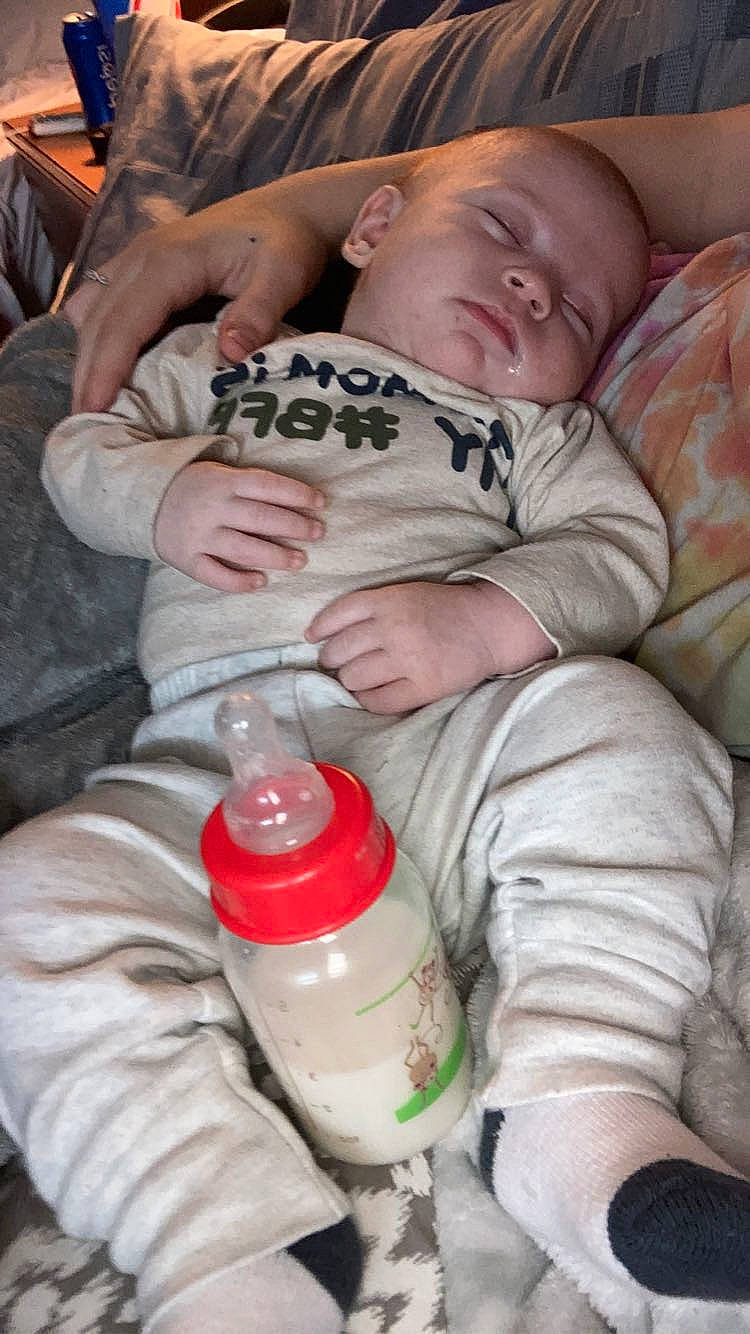 Koa joined the competition — help win amazing prizes! baby, baby_toddler_clothing, bottle, bottle_cap, carmine, cheek, child, comfort, drink, drinkware, gas, hand, nail, organ, person, plastic_bottle, red, sitting, skin, toddler