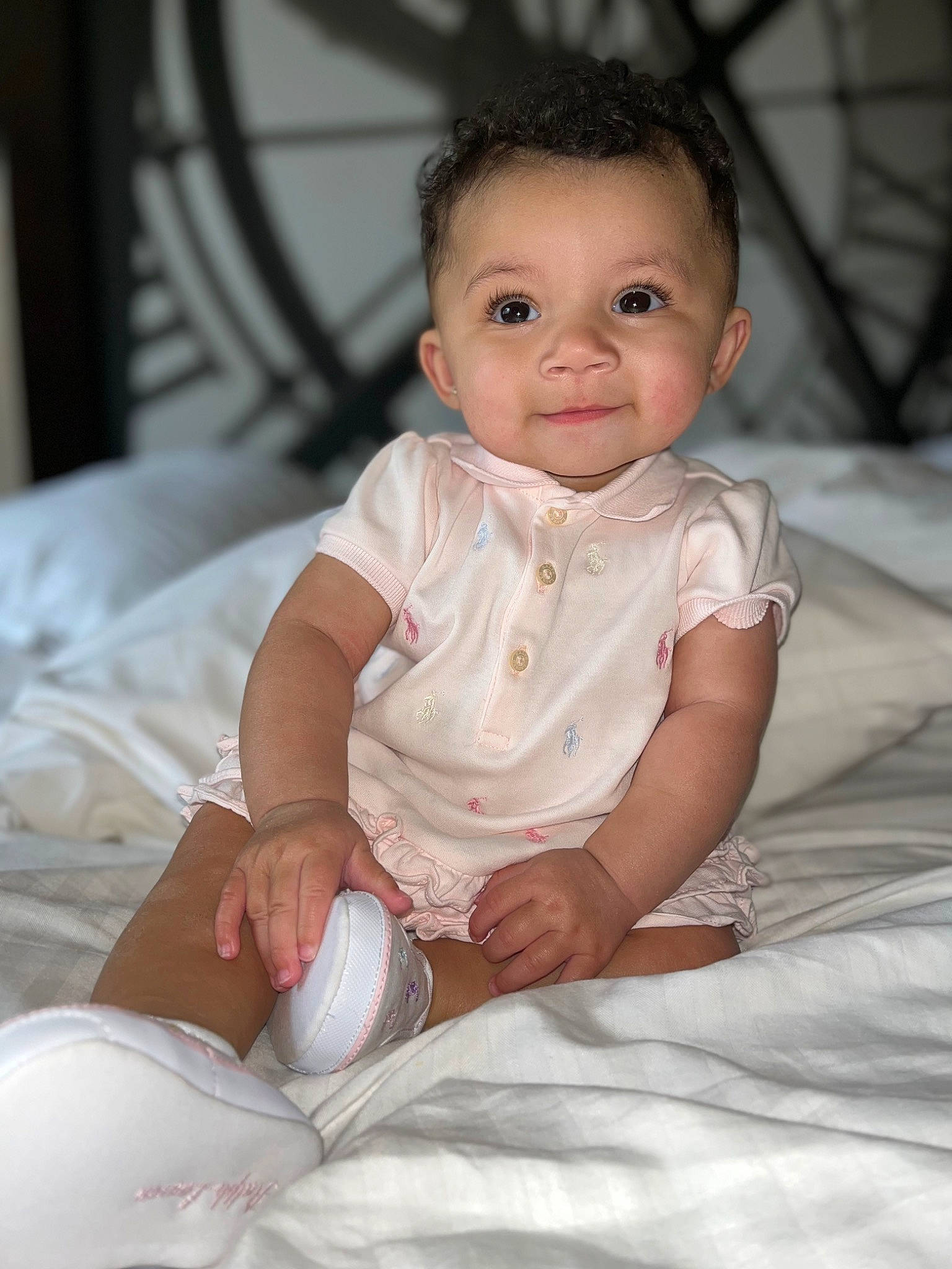 Brixley Sakura Kimberly is registered to the contest to win money with this photo: baby, baby_toddler_clothing, cheek, child, comfort, dress, eye, face, flash_photography, happy, head, iris, joy, lip, mammal, person, product, skin, sleeve, smile