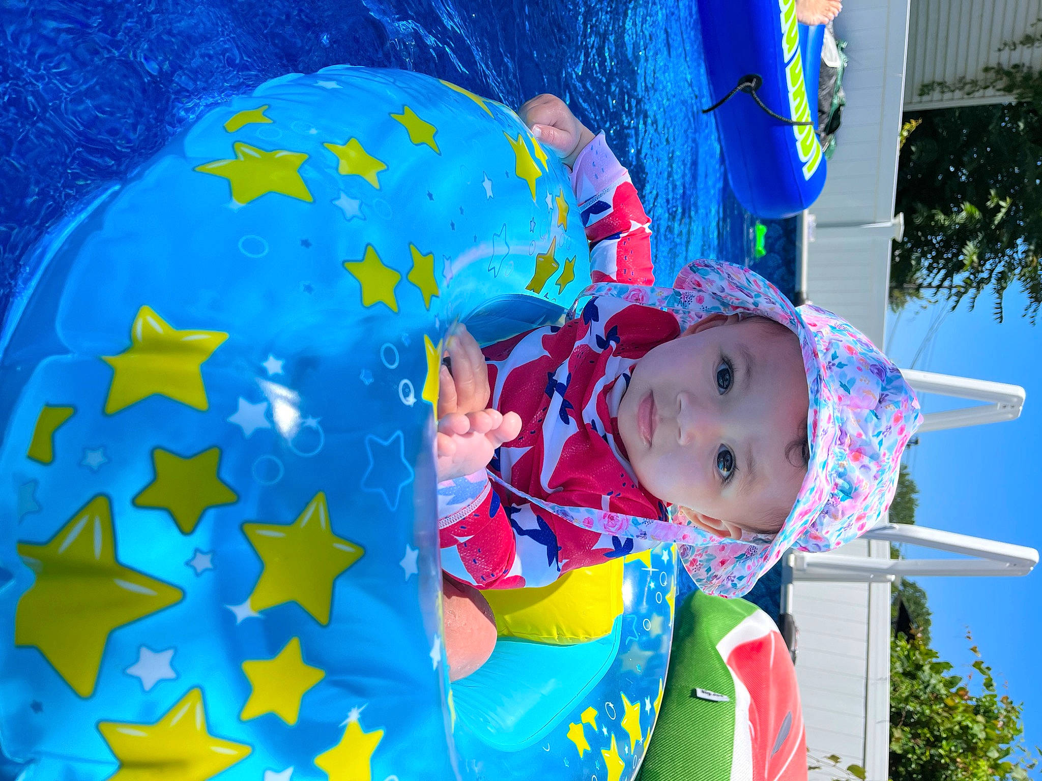 Brixley Sakura Kimberly joined the competition — help win amazing prizes! azure, baby, blue, electric_blue, facial_expression, fun, happy, hat, headwear, leisure, light, party_supply, person, photograph, recreation, red, sky, smile, toddler, tree