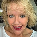 Stacy E.