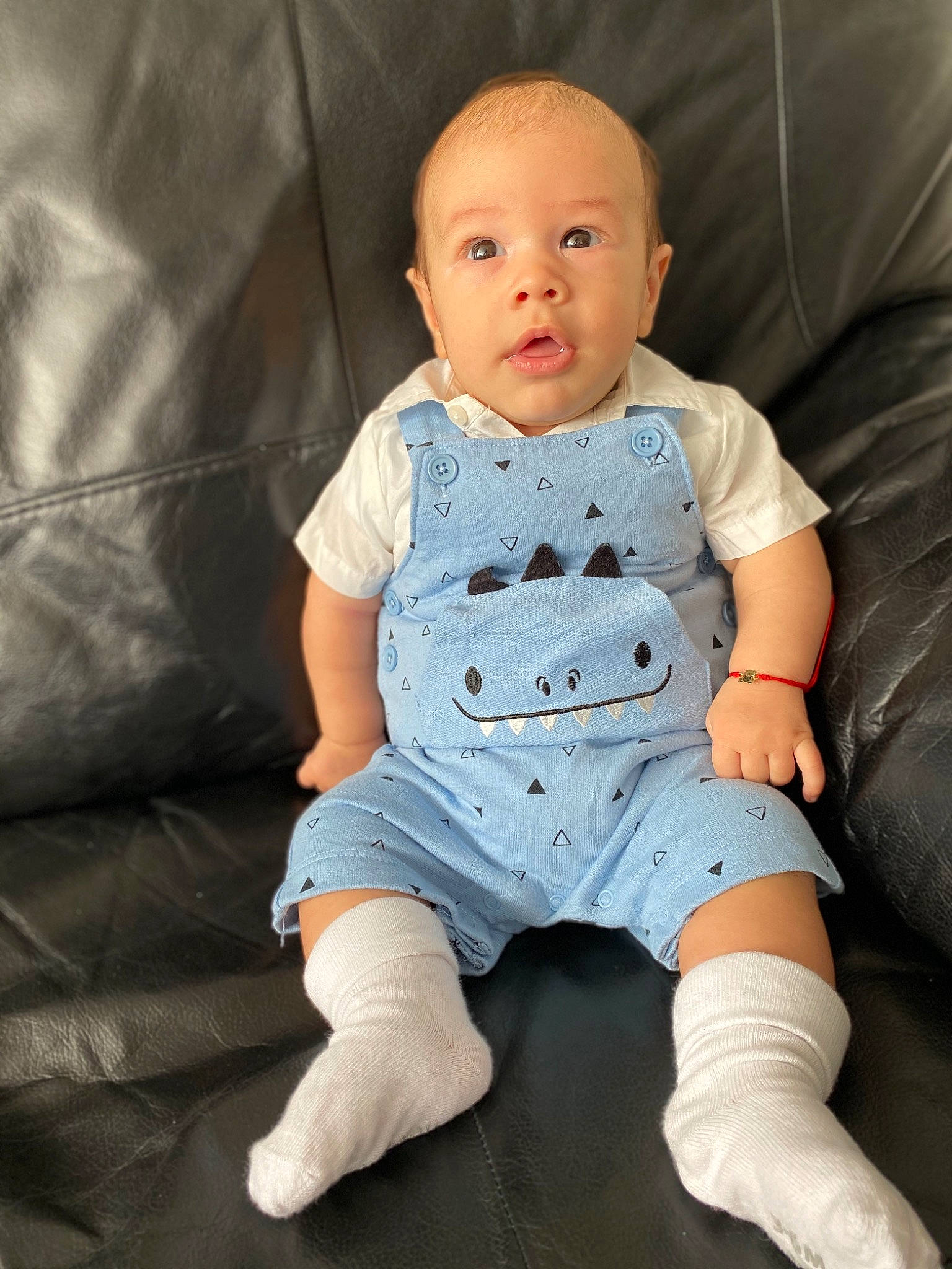 Ayan is registered to the contest to win money with this photo: arm, baby, baby_products, baby_toddler_clothing, cheek, child, leg, person, product, sitting, skin, sleeve, t_shirt, toddler