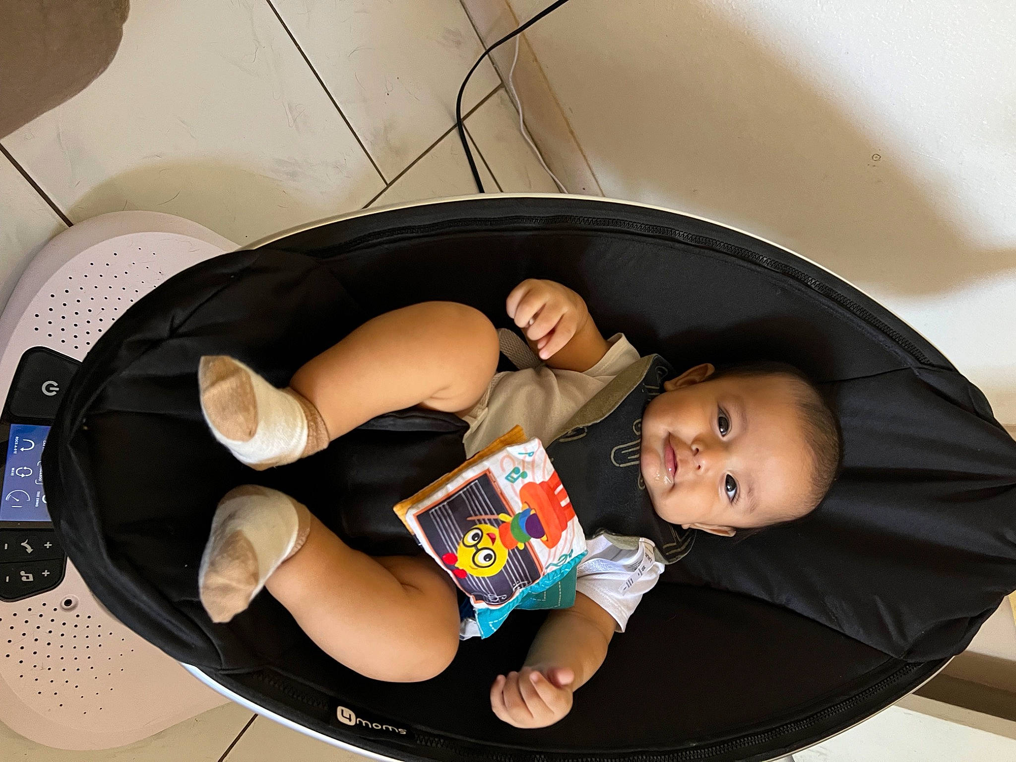 Derek is registered to the contest to win money with this photo: auto_part, automotive_design, automotive_wheel_system, baby, baby_carriage, baby_products, bumper, car_seat, child, comfort, finger, foot, fun, human_leg, knee, lap, person, sitting, smile, thigh