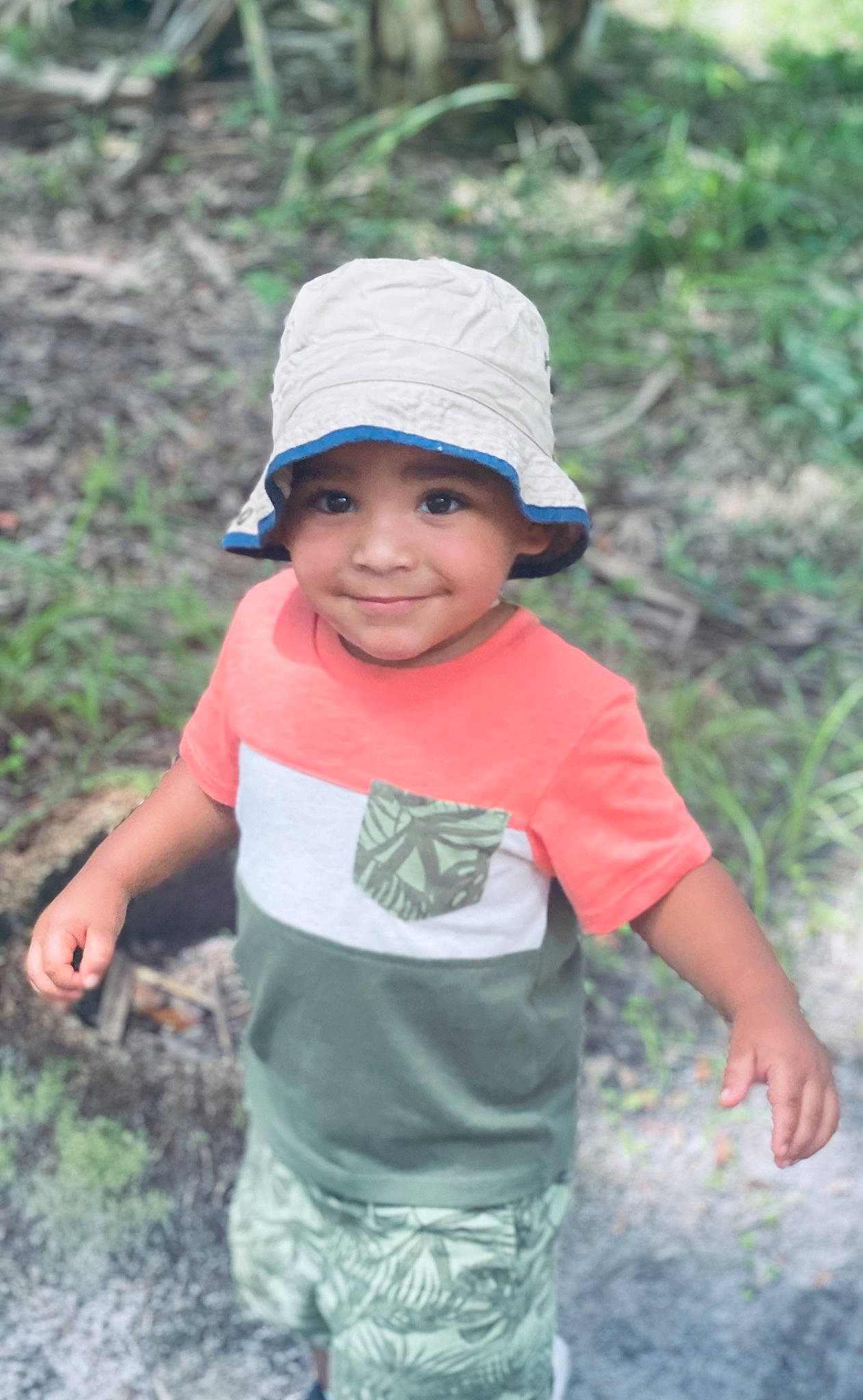 Jordin joined the competition — help win amazing prizes! baby_toddler_clothing, baseball_cap, cap, child, fun, grass, happy, hat, headgear, headwear, joy, leaf, leisure, people_in_nature, person, plant, recreation, shorts, sleeve, smile