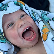 Charlie joined the competition — help win amazing prizes! child, toddler, smiling, happy, face, mouth_open, teeth, tongue, towel, colorful, blue_eyes, closeup, skin, head, expression, joy, candid, portrait, baby, cute