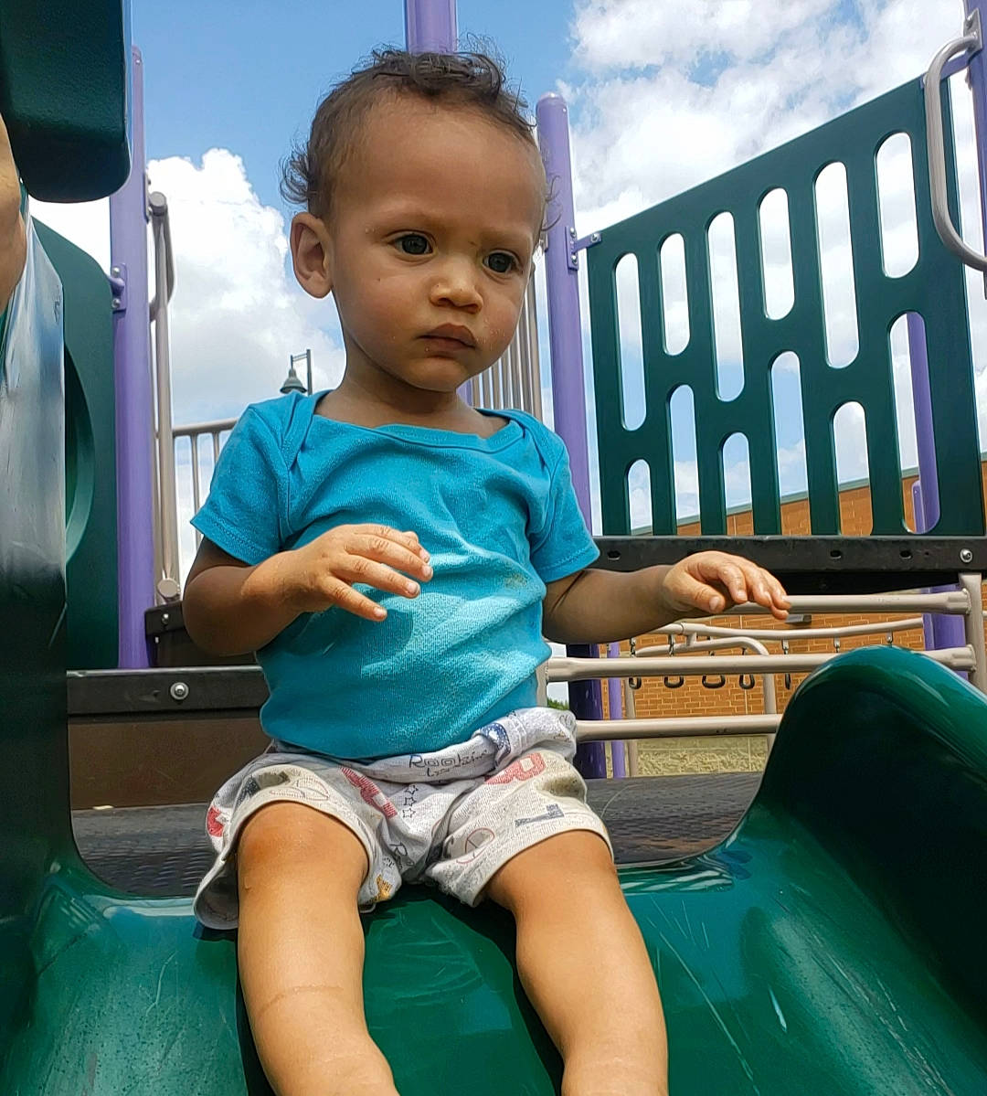 Ezra King joined the competition — help win amazing prizes! arm, baby, child, fun, leg, leisure, person, play, sitting, smile, teal, toddler, turquoise, vacation