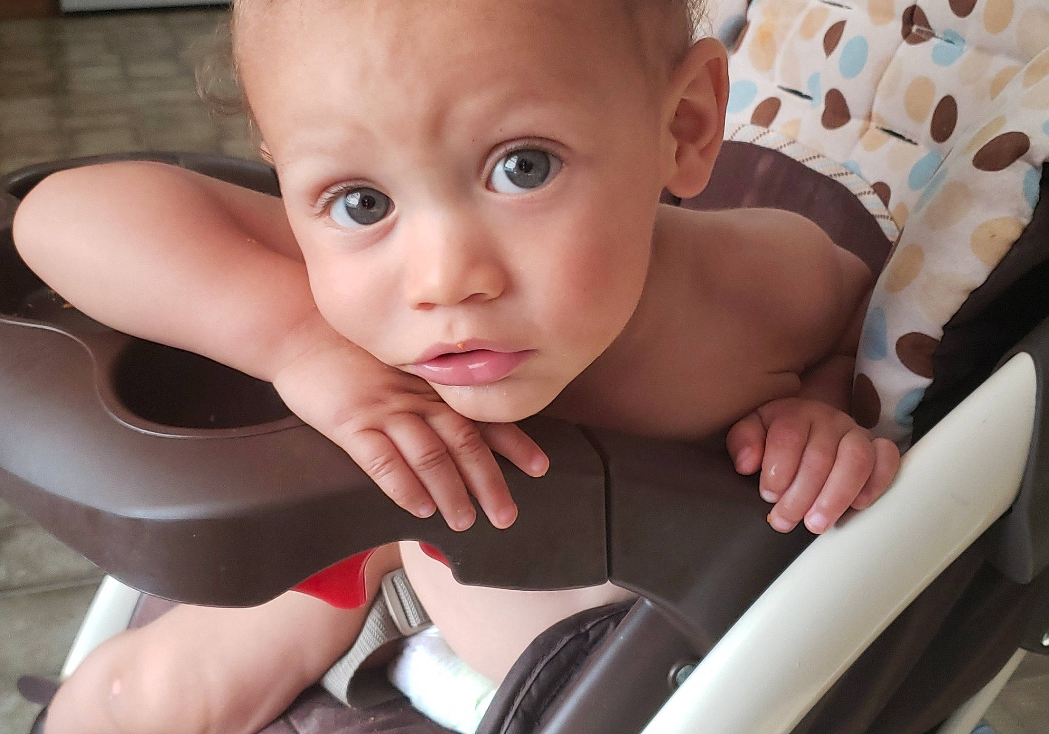 Ezra King is registered to the contest to win money with this photo: arm, baby, cheek, child, ear, eye, face, finger, hand, head, leg, mouth, muscle, nose, person, product, sitting, skin, smile, toddler