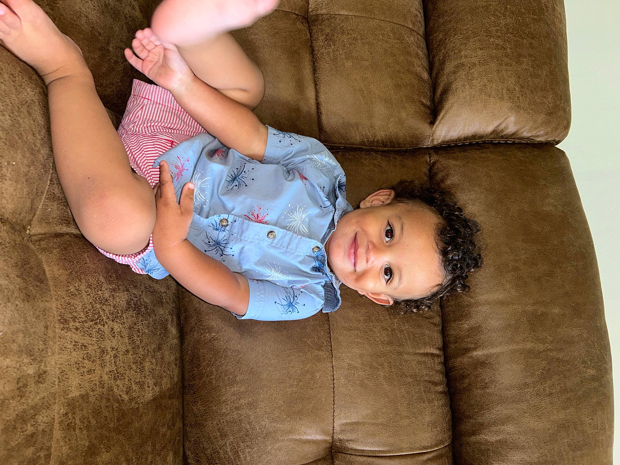 Kamaree is registered to the contest to win money with this photo: abdomen, baby, baby_toddler_clothing, cheek, child, comfort, couch, elbow, gesture, happy, human_body, human_leg, joy, lap, person, sitting, skin, textile, thigh, toddler