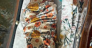Novaleigh joined the competition — help win amazing prizes! newborn, baby, sleeping, swaddled, floral, blanket, crib, towel, infant, cozy, peaceful, indoors, closeup, portrait, resting, cute, child, soft, fabric, patterned