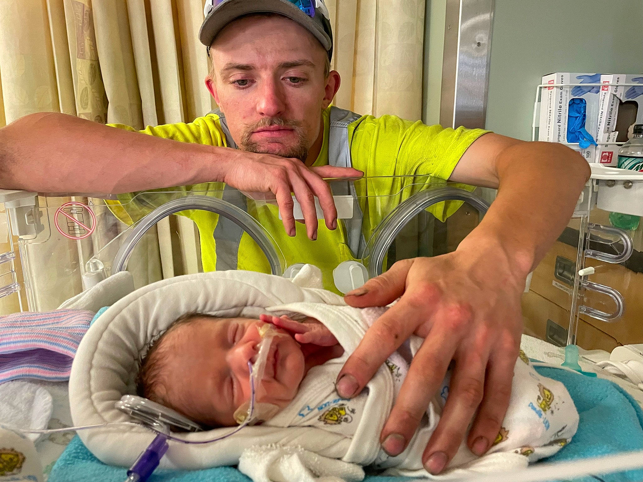 Mason joined the competition — help win amazing prizes! baby, baseball_cap, cap, child, comfort, event, face, happy, hat, health_care, hospital, medical, medical_equipment, medical_procedure, patient, person, room, service, toddler