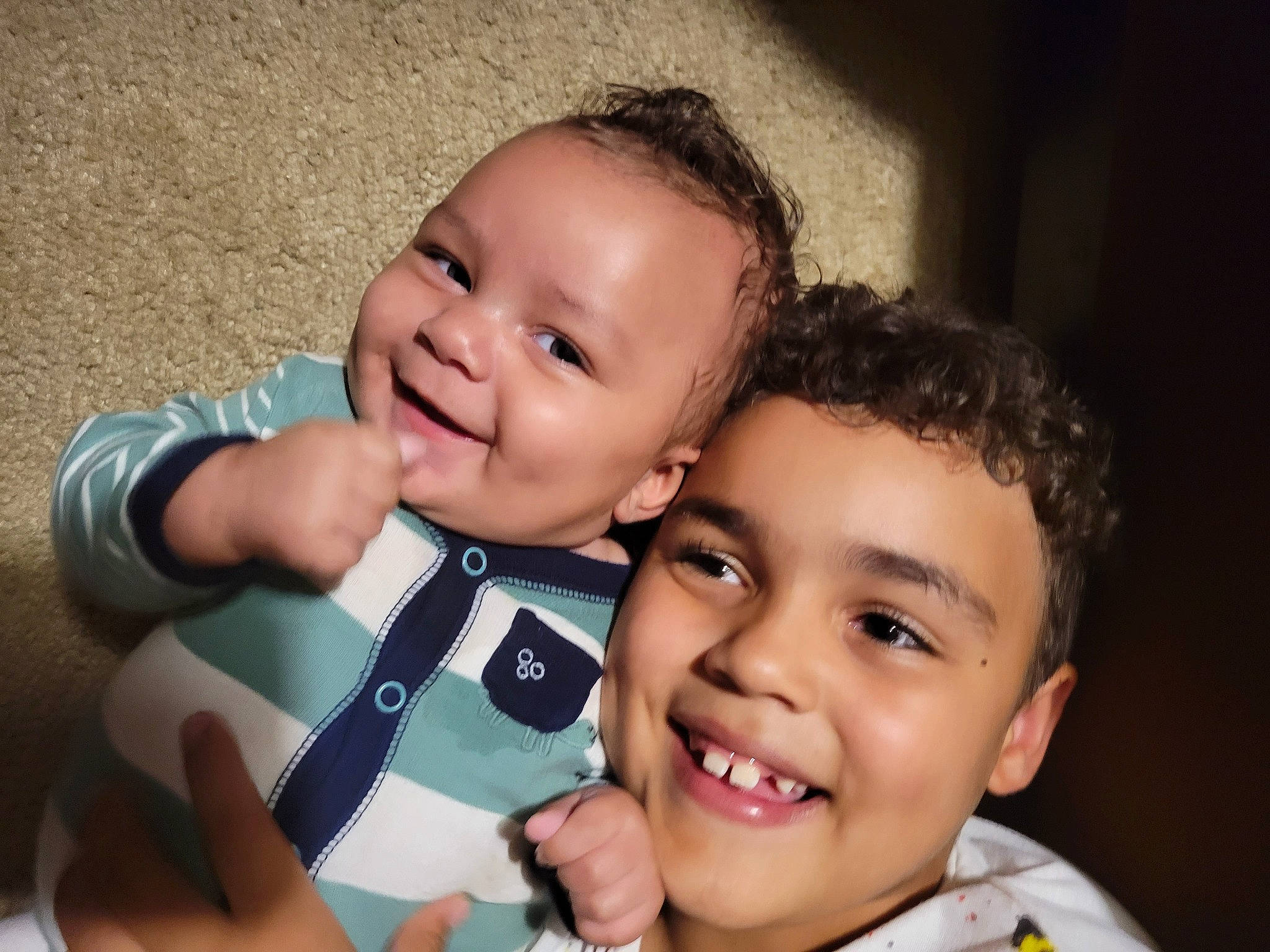 Kyle is registered to the contest to win money with this photo: baby, baby_toddler_clothing, cheek, chin, eyebrow, face, finger, fun, gesture, happy, iris, joy, lip, mammal, mouth, nose, person, skin, smile, thumb