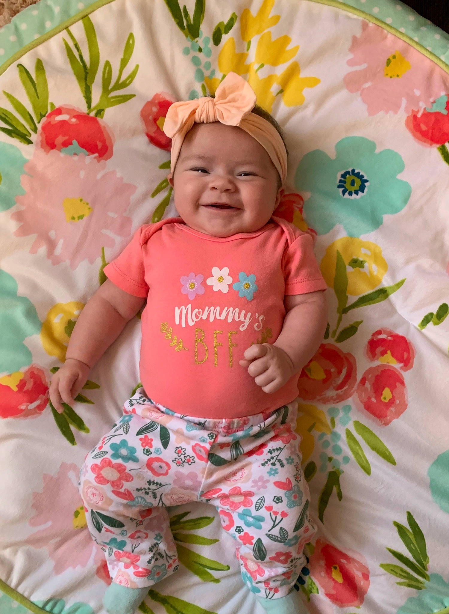 Emalia is registered to the contest to win money with this photo: baby, baby_products, baby_toddler_clothing, child, pattern, person, pink, product, smile, textile, toddler