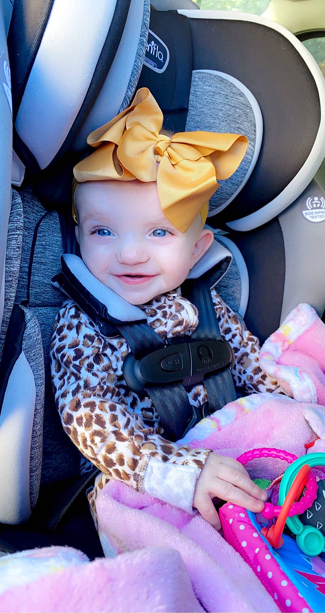 Braylynn is registered to the contest to win money with this photo: baby, baby_carriage, baby_products, baby_toddler_clothing, blue, cap, child, costume_hat, electric_blue, event, fun, happy, hat, head, headgear, headwear, person, pink, product, purple