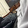 Zoey Monae is registered to the contest to win money with this photo: animal, bed, blanket, cat, comfort, cozy, curious, cute, domestic, fabric, furniture, household, indoor, pet, resting, room, sleeping_area, tabby, television, wooden_headboard