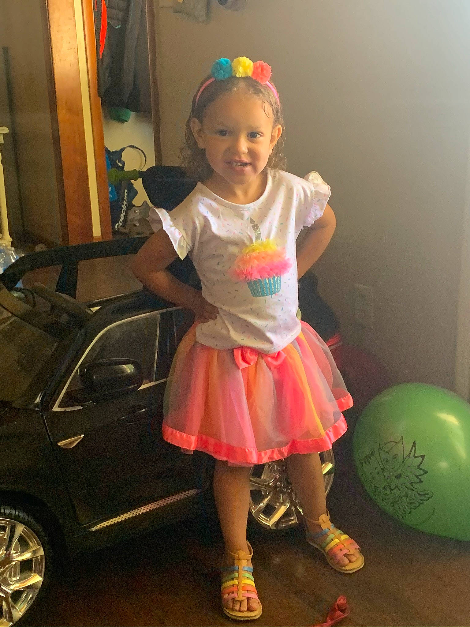 Kandyce is registered to the contest to win money with this photo: car, child, costume, family_car, joy, luxury_vehicle, party_supply, person, pink, toddler, vehicle, yellow