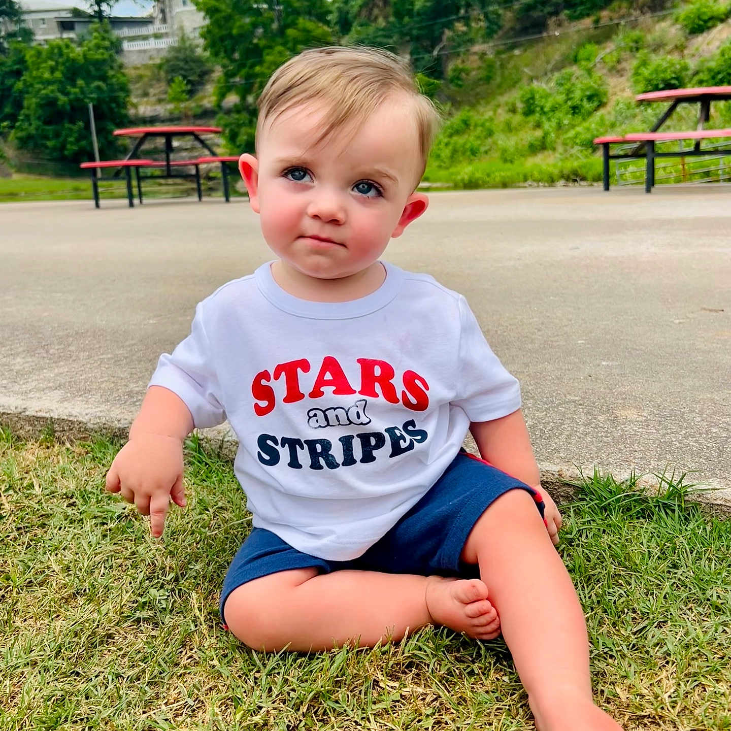 Buckley joined the competition — help win amazing prizes! bench, boy, child, clothing, face, furniture, grass, head, male, nature, outdoors, park, person, photography, plant, portrait, shorts, sitting, t_shirt, vegetation