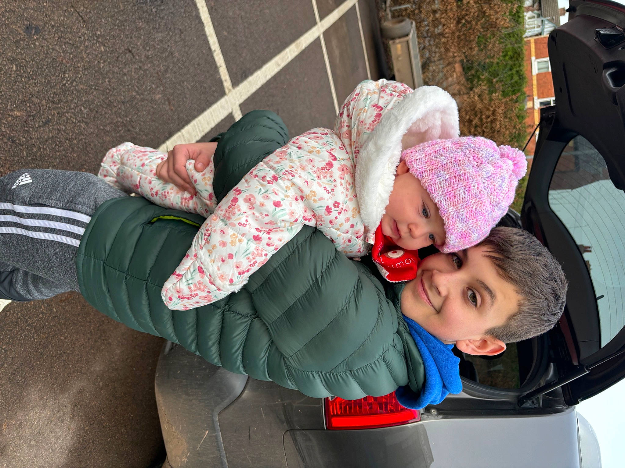 Theo-James joined the competition — help win amazing prizes! baby, child, clothing, comfort, fun, grass, happy, headwear, human_leg, joy, knee, leisure, magenta, pattern, person, plaid, recreation, sitting, sock, thigh