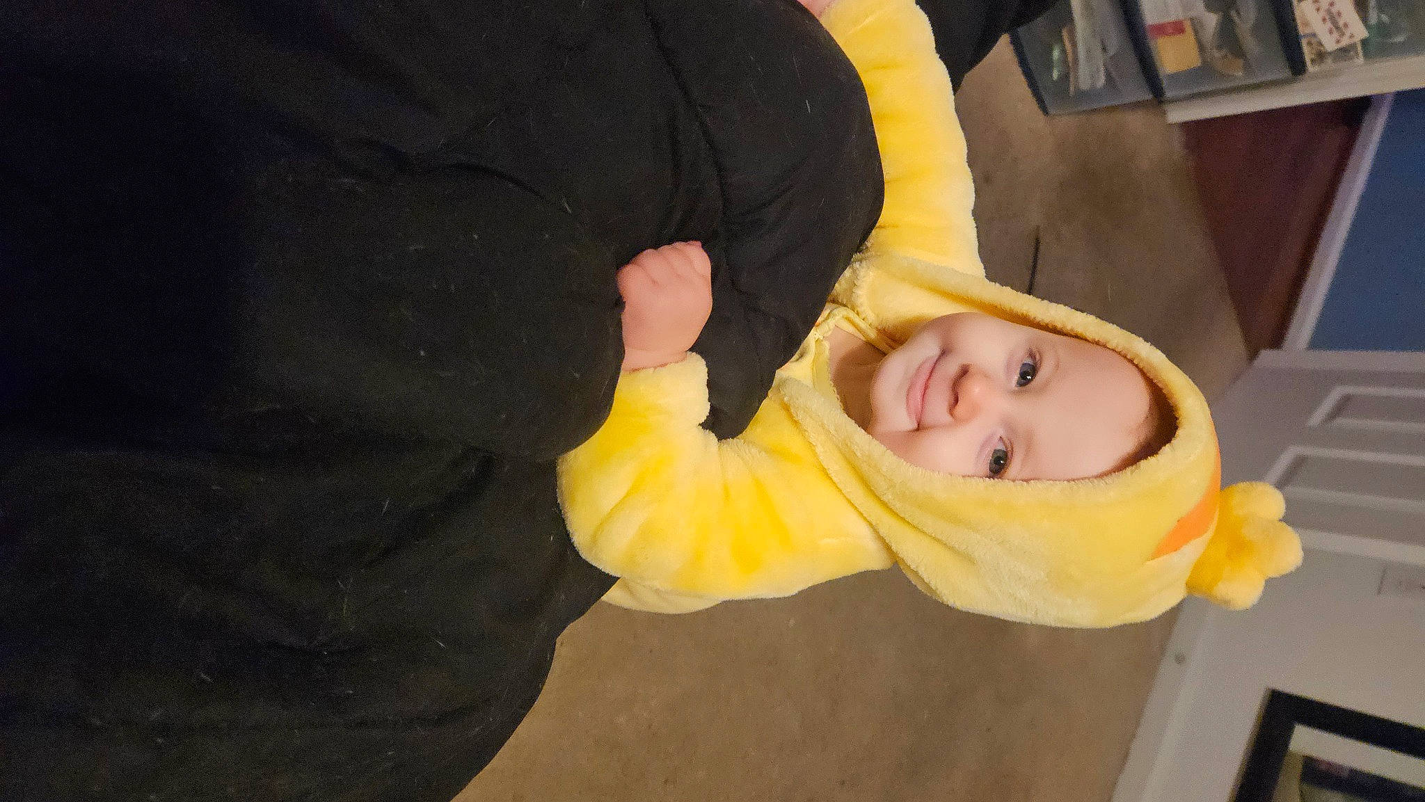 Kali is registered to the contest to win money with this photo: cheek, comfort, flooring, fun, happy, headwear, joy, person, scarf, smile, wood