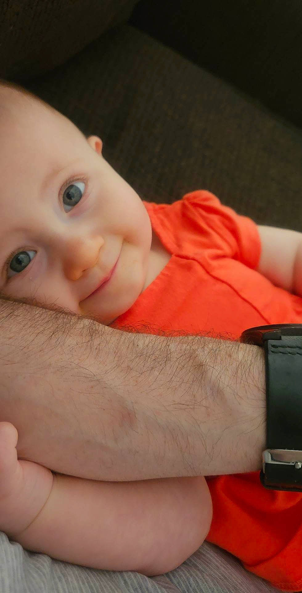 Kali joined the competition — help win amazing prizes! arm, baby, baby_toddler_clothing, cheek, comfort, finger, hand, happy, human_body, joy, lip, mobile_phone, muscle, nail, nose, person, skin, sleeve, smile, thumb