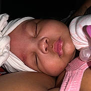 Dakhota joined the competition — help win amazing prizes! baby, sleeping, infant, head_wrap, pacifier, close_up, skin, peaceful, resting, child, cute, soft, face, person, pink, bow, arm, newborn, portrait, tender