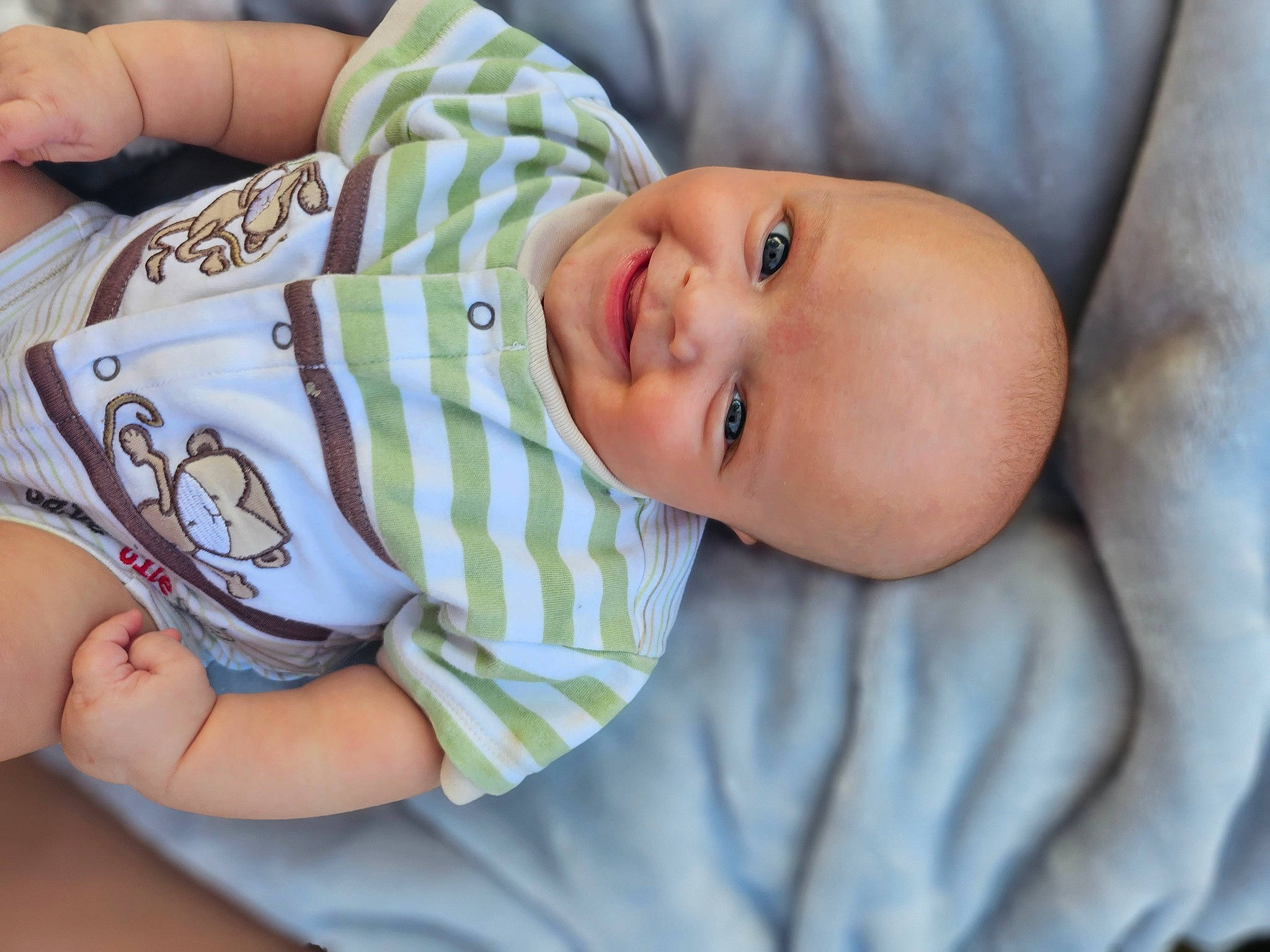 Lochlan joined the competition — help win amazing prizes! baby, baby_products, baby_toddler_clothing, cheek, child, comfort, eye, finger, grass, hand, happy, iris, joy, lip, nose, pattern, person, skin, sleeve, smile