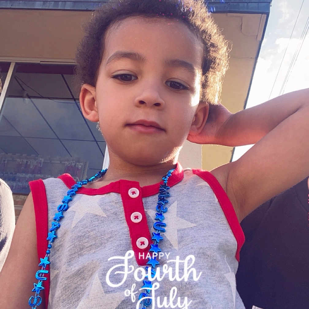 Zechariah is registered to the contest to win money with this photo: accessories, architecture, bead, building, child, clothing, costume, face, female, flower, flowerarrangement, girl, head, jewelry, necklace, person, photography, plant, portrait, t_shirt