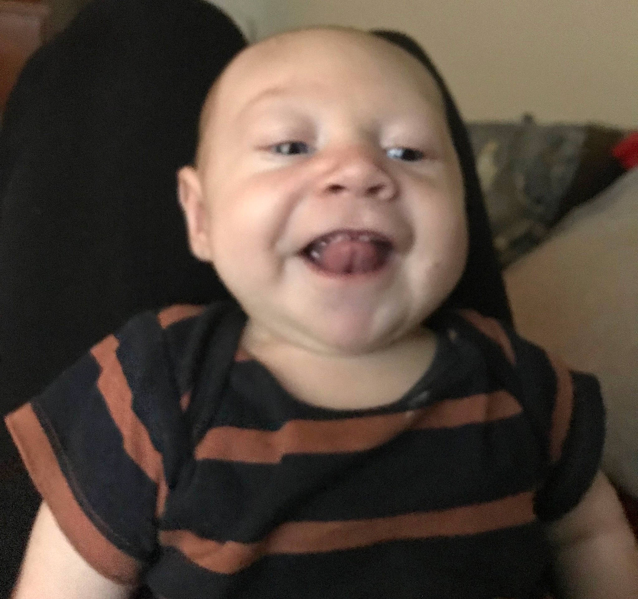 Kain is registered to the contest to win money with this photo: baby, baby_laughing, baby_toddler_clothing, cheek, child, cool, finger, happy, iris, jaw, joy, lip, mouth, neck, nose, outerwear, person, sleeve, smile, toddler