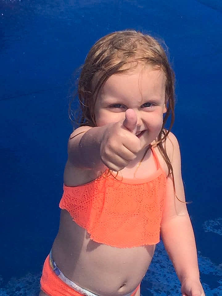 Amberlynn joined the competition — help win amazing prizes! abdomen, child, face, facial_expression, fun, happy, joy, leisure, lifejacket, mouth, neck, nose, person, smile, summer, toddler, vacation, water