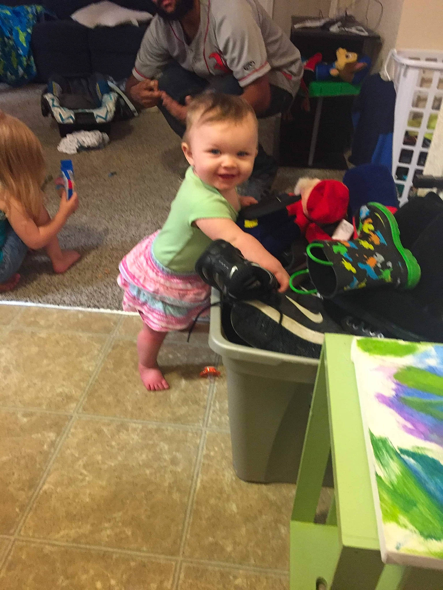 Sable is registered to the contest to win money with this photo: adaptation, bucket, child, floor, fun, leisure, person, play, toddler