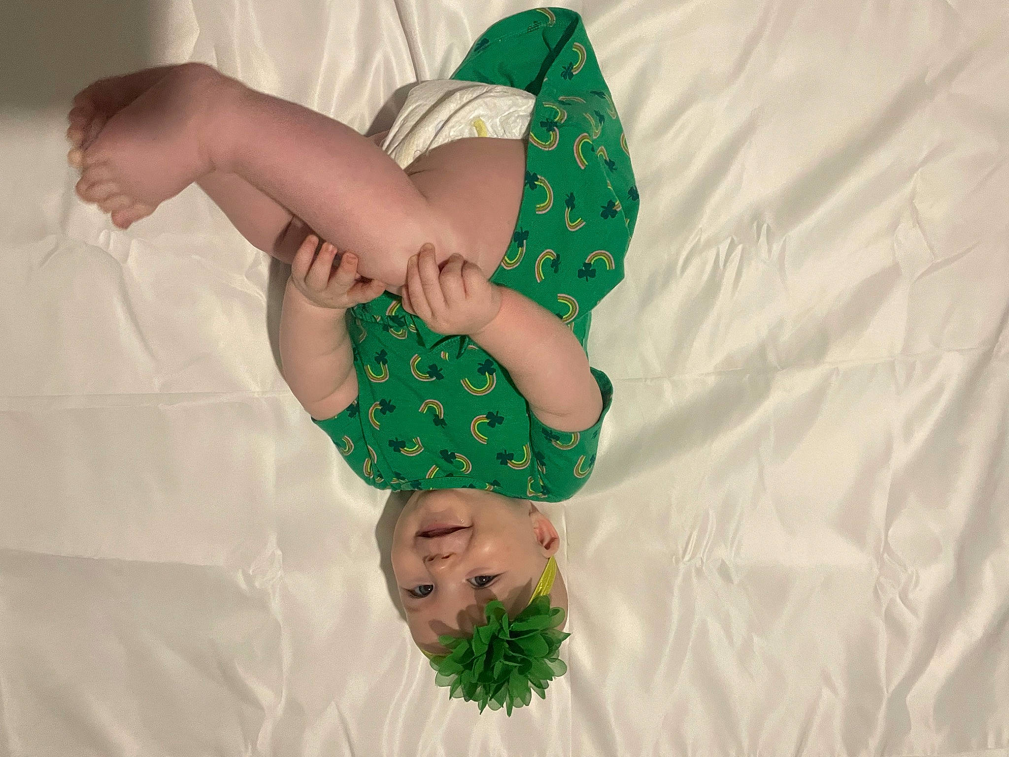 Addi is registered to the contest to win money with this photo: baby, baby_products, baby_toddler_clothing, child, comfort, elbow, event, fashion_accessory, finger, gesture, happy, headwear, joy, linens, nail, pattern, person, sleeve, thumb, toddler