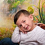 child, boy, portrait, pose, white_shirt, blue_jeans, smile, face, hair, nature_background, plants, greenery, colorful, whimsical, cute, young, studio_photo, casual_clothing, happy, resting_head