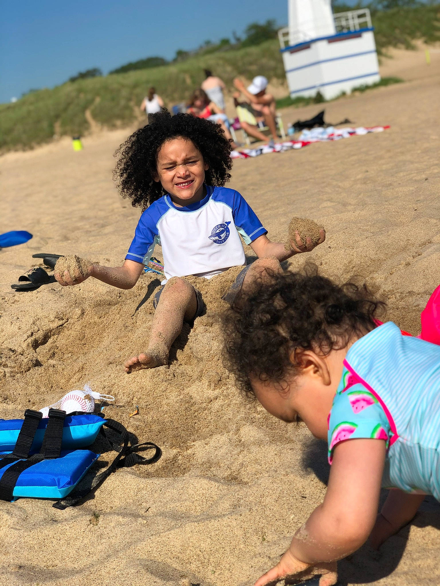 Jayden is registered to the contest to win money with this photo: adaptation, beach, child, coast, fun, joy, leisure, person, play, sand, sea, soil, sorrow, summer, vacation