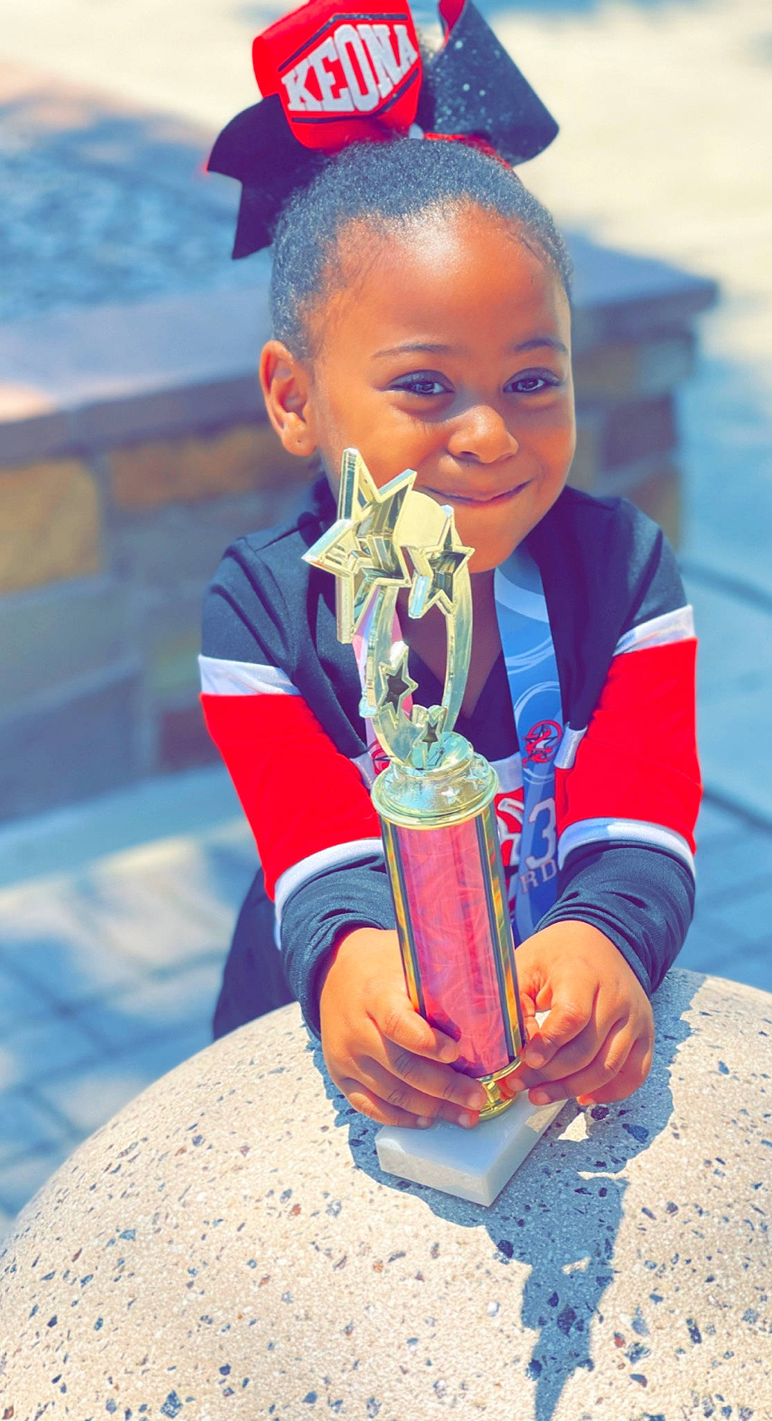 Keona joined the competition — help win amazing prizes! blue, child, electric_blue, event, face, fashion_design, fun, hand, happy, head, jewellery, joy, leisure, musical_instrument, person, recreation, smile, summer, temple, toddler