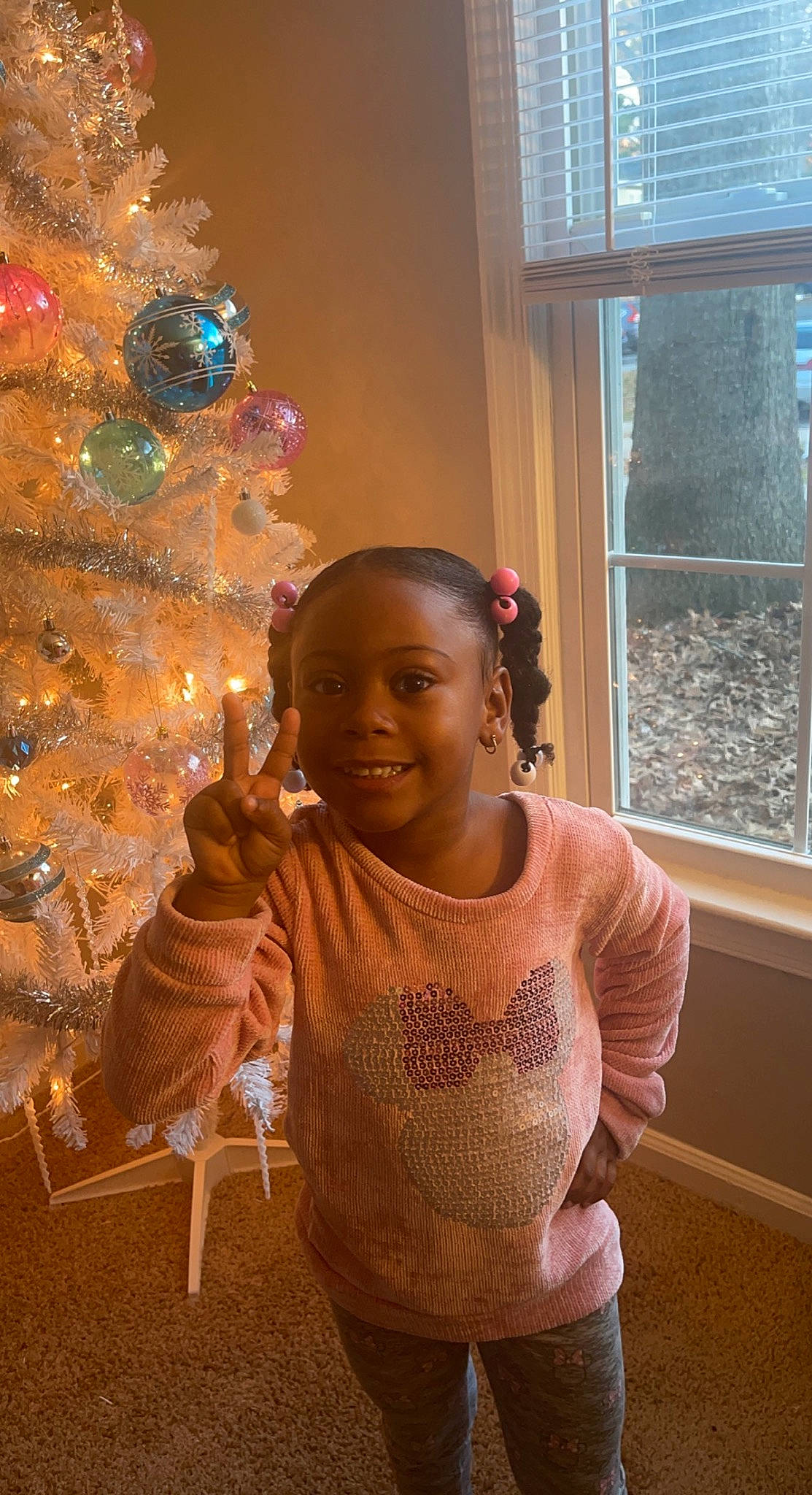 Keona joined the competition — help win amazing prizes! child, christmas_decoration, christmas_ornament, christmas_tree, conifer, event, fun, happy, holiday, holiday_ornament, jewellery, joy, ornament, person, sitting, smile, tradition, tree, window, window_blind