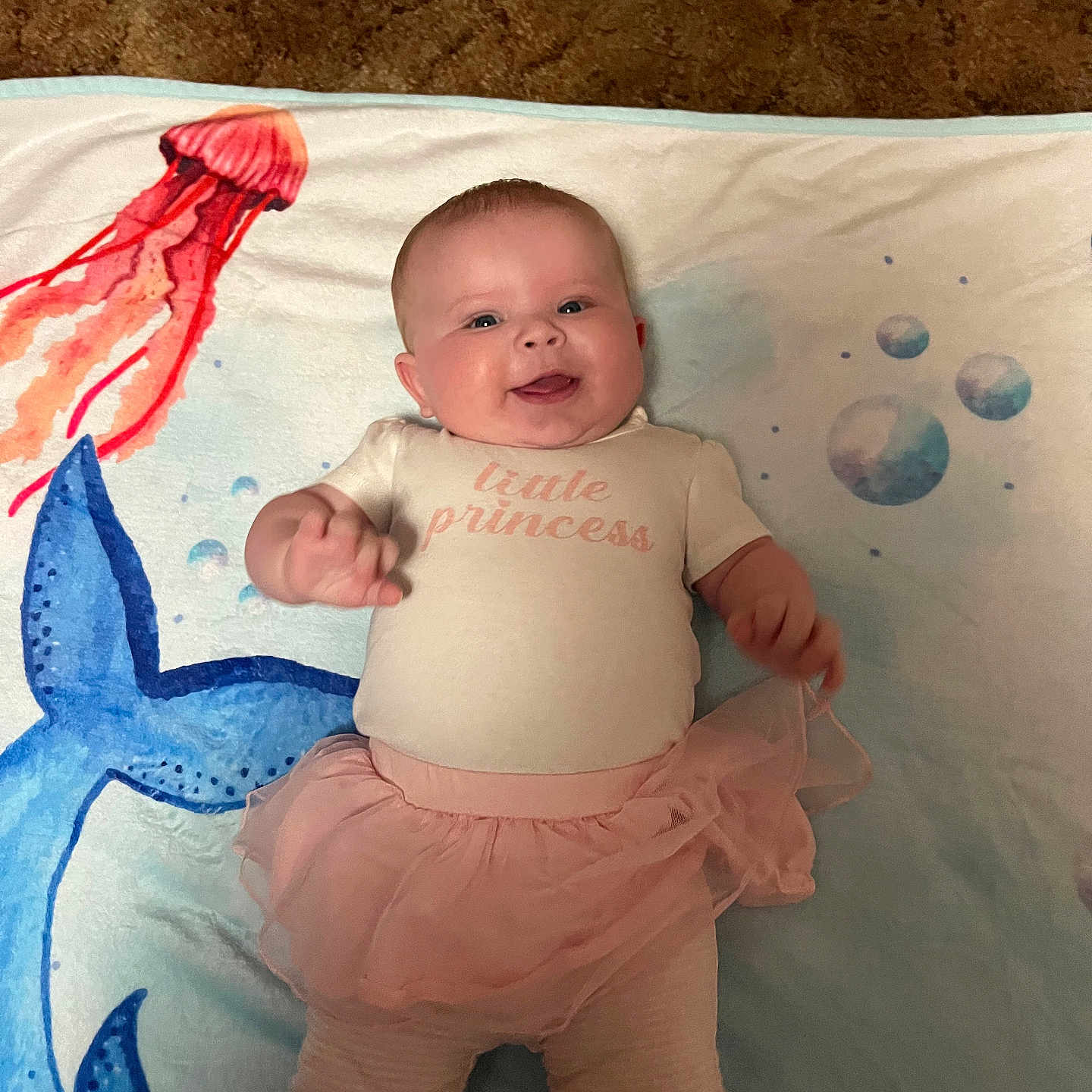 Elizabeth is registered to the contest to win money with this photo: baby, bed, bedroom, bodypart, clothing, cushion, face, finger, furniture, hand, happy, head, homedecor, newborn, pants, person, photography, portrait, smile, t_shirt