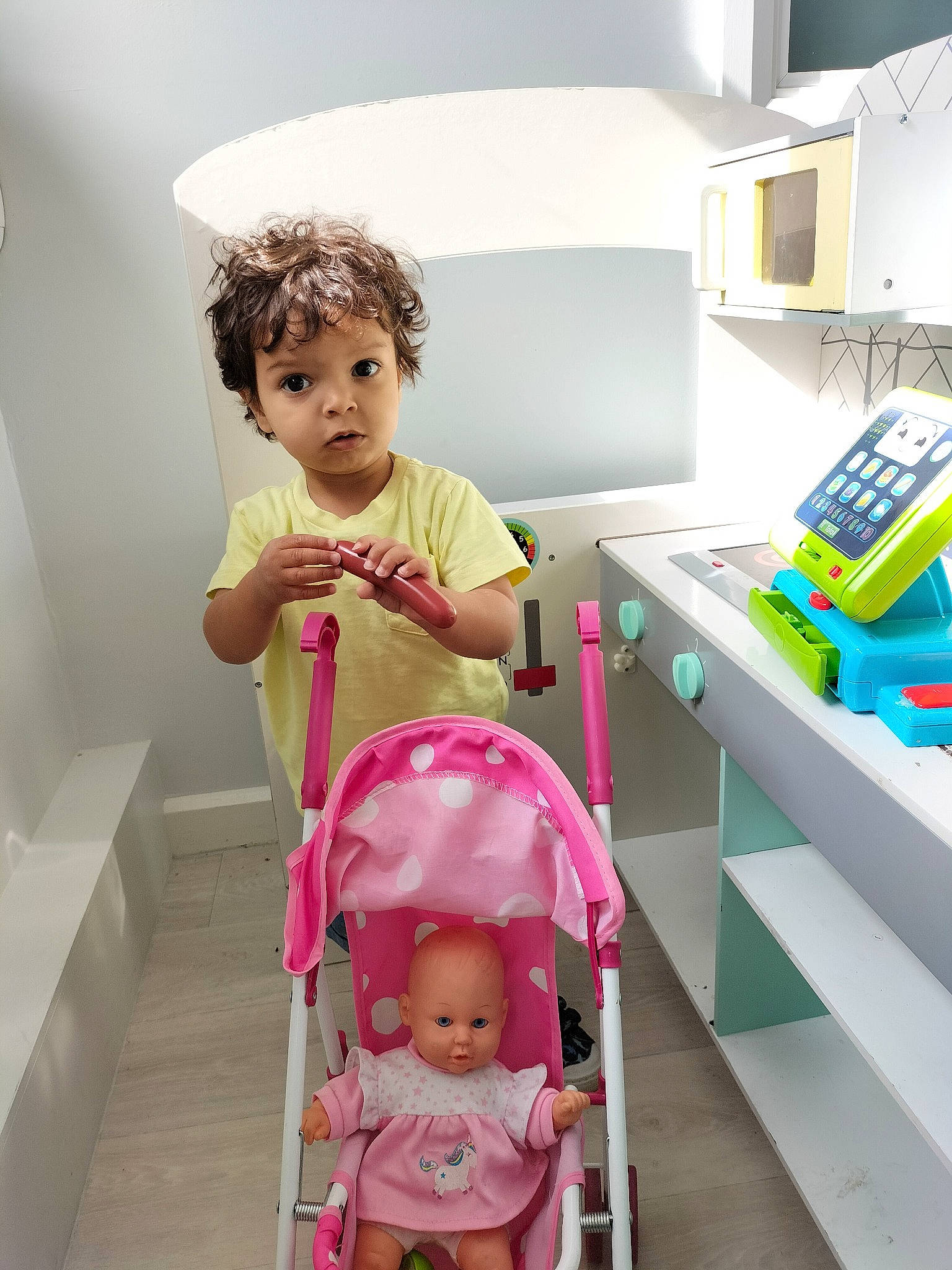 Dawood joined the competition — help win amazing prizes! baby, baby_carriage, baby_products, baby_safety, baby_toddler_clothing, child, dress, happy, magenta, person, pink, room, service, shelf, shelving, sitting, skin, sleeve, surprise, toddler
