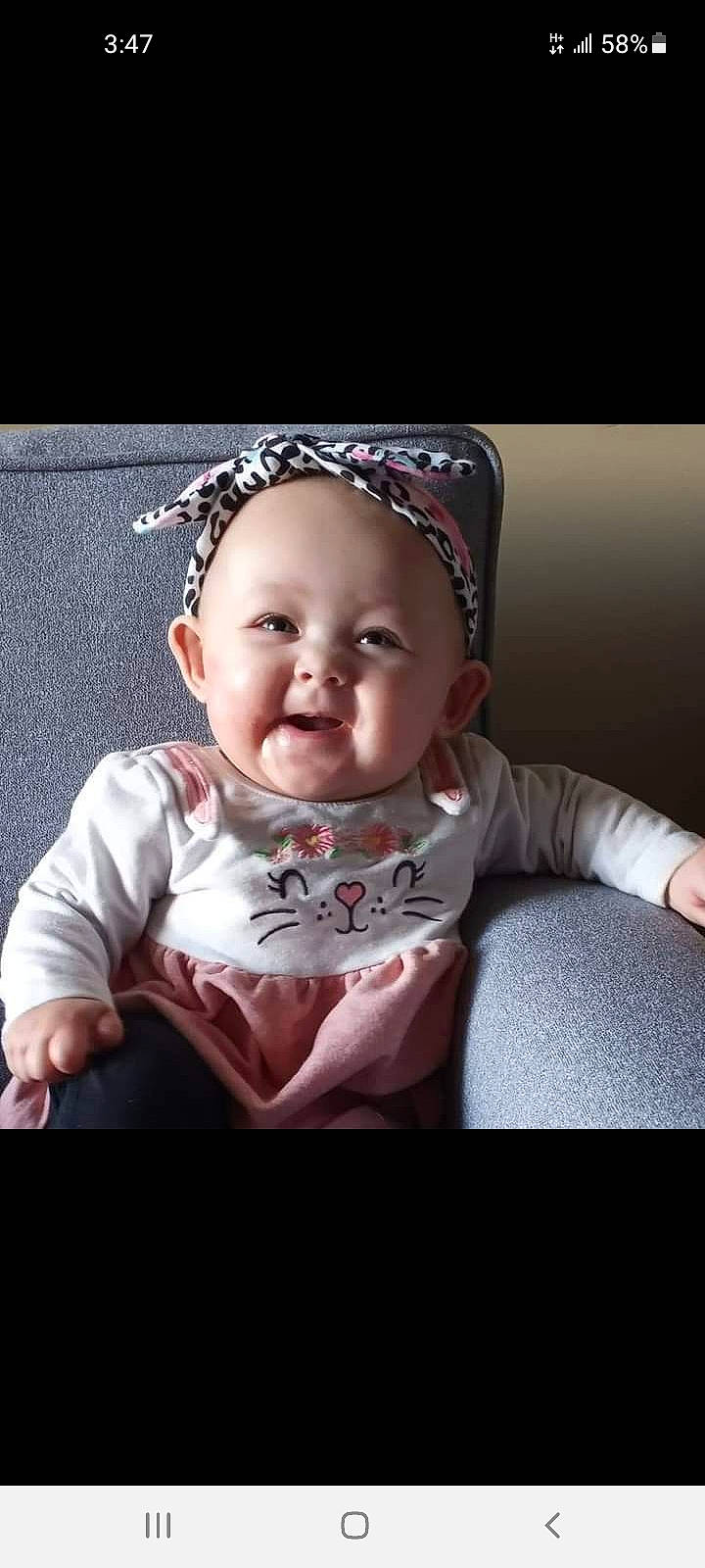 Aiyanna joined the competition — help win amazing prizes! baby, baby_products, baby_toddler_clothing, cap, cheek, child, costume_hat, fashion_accessory, flash_photography, happy, headband, iris, pattern, person, portrait_photography, sitting, skin, sleeve, smile, t_shirt