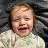 toddler, child, smiling, face, happy, toy_story, clothing, casual_wear, portrait, close_up, baby, young_child, sunlight, indoor, cute, expression, cheerful, headshot, person, infant