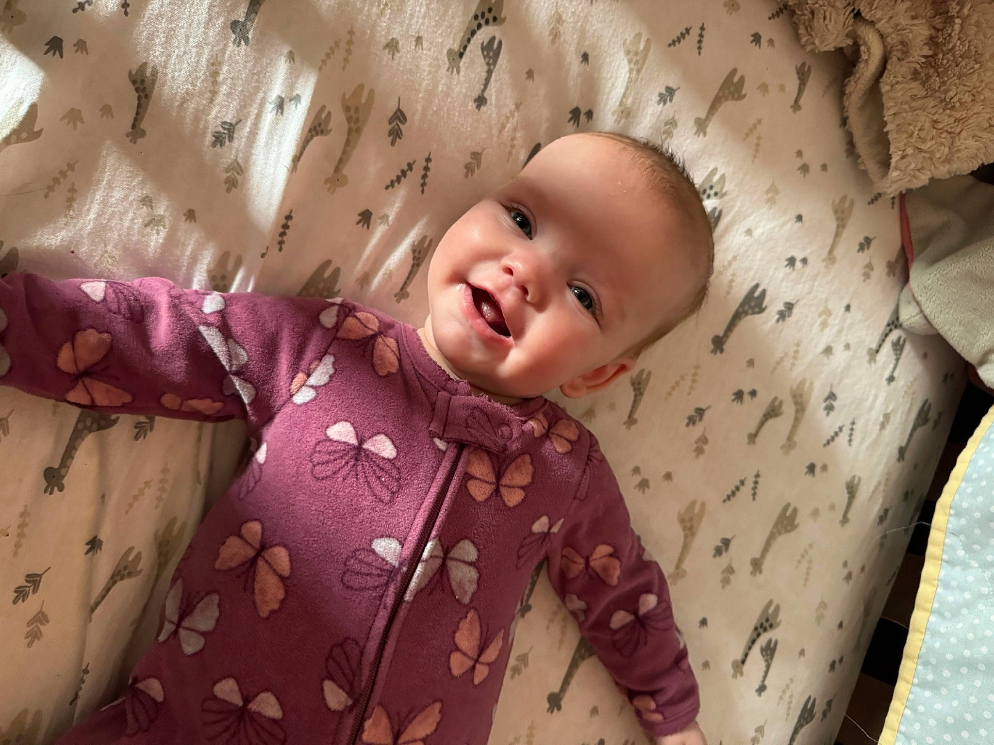 Lincoln joined the competition — help win amazing prizes! baby, baby_laughing, baby_toddler_clothing, bed, bedding, child, comfort, fun, happy, linens, pattern, person, pink, product, purple, room, skin, sleeve, smile, textile