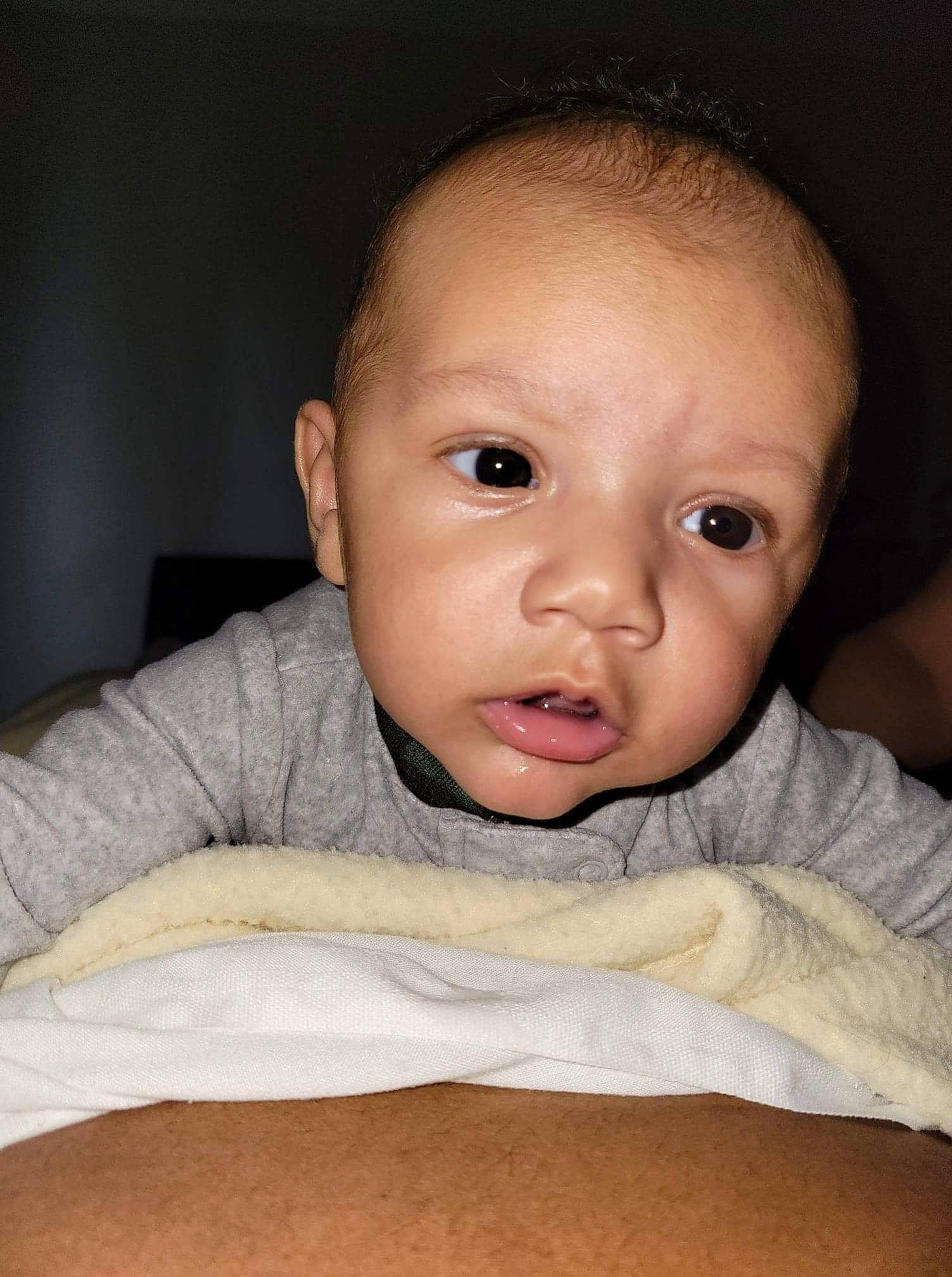 Jayden joined the competition — help win amazing prizes! baby, cheek, child, comfort, ear, eyebrow, finger, flash_photography, fun, gesture, iris, linens, lip, mouth, no_expression, nose, person, sleeve, smile, thumb