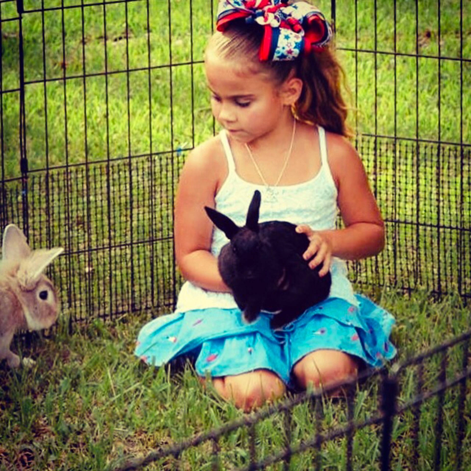 Rayna is registered to the contest to win money with this photo: child, girl, grass, hair_accessory, headgear, person, play, product, toddler